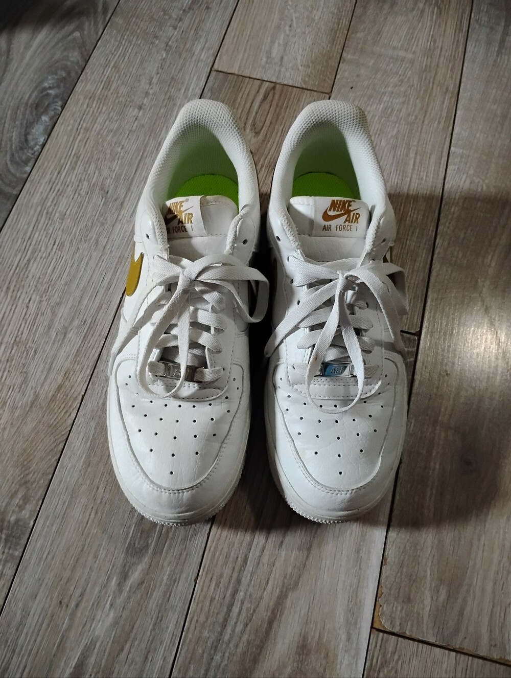 Women’s Nike Air Force 1 White Sneakers with Olive/Brownish Swoosh